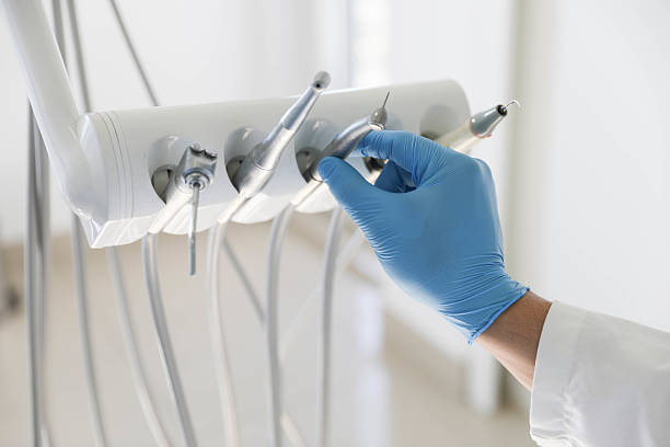 Professional Tooth Extraction technician working in Scottville, MI